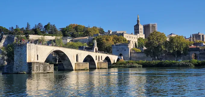 Cannabis culture in Avignon, France, featuring the historic city, Palais des Papes and local nightlife scene
